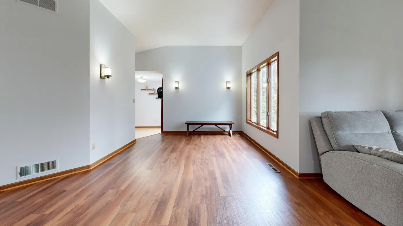 Bright room with wood-tone baseboards